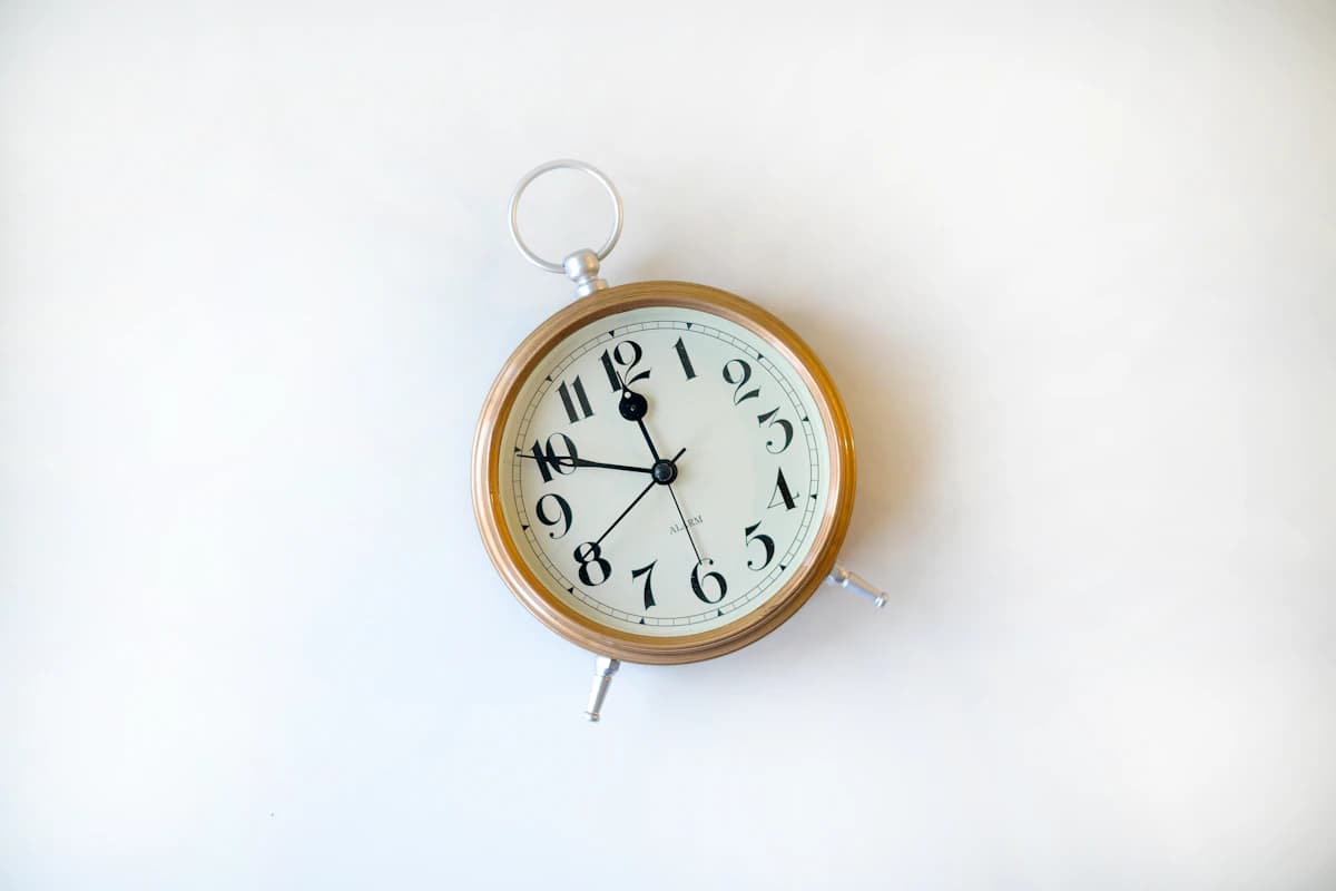 Representative photograph of a round analogue clock